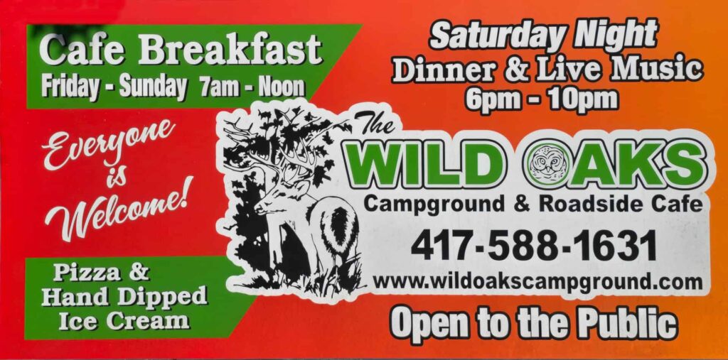 Wild Oaks Camping 2026 sign